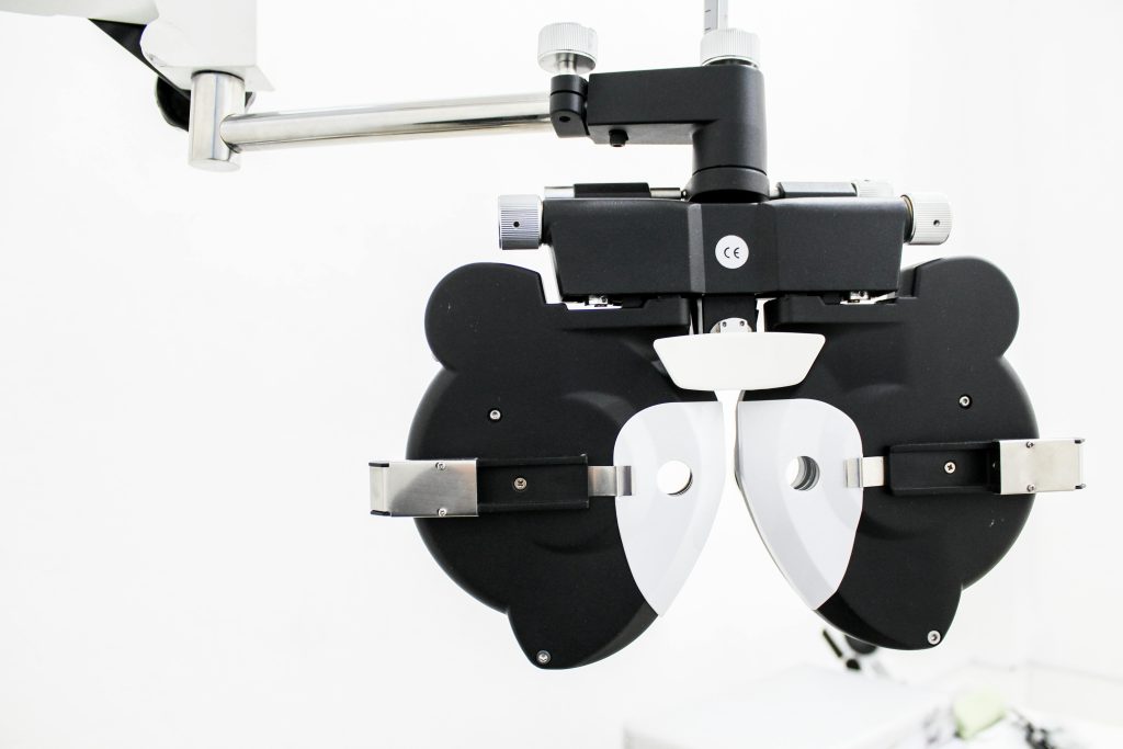 High-quality close-up image of a phoropter, essential for eye examinations in ophthalmology.